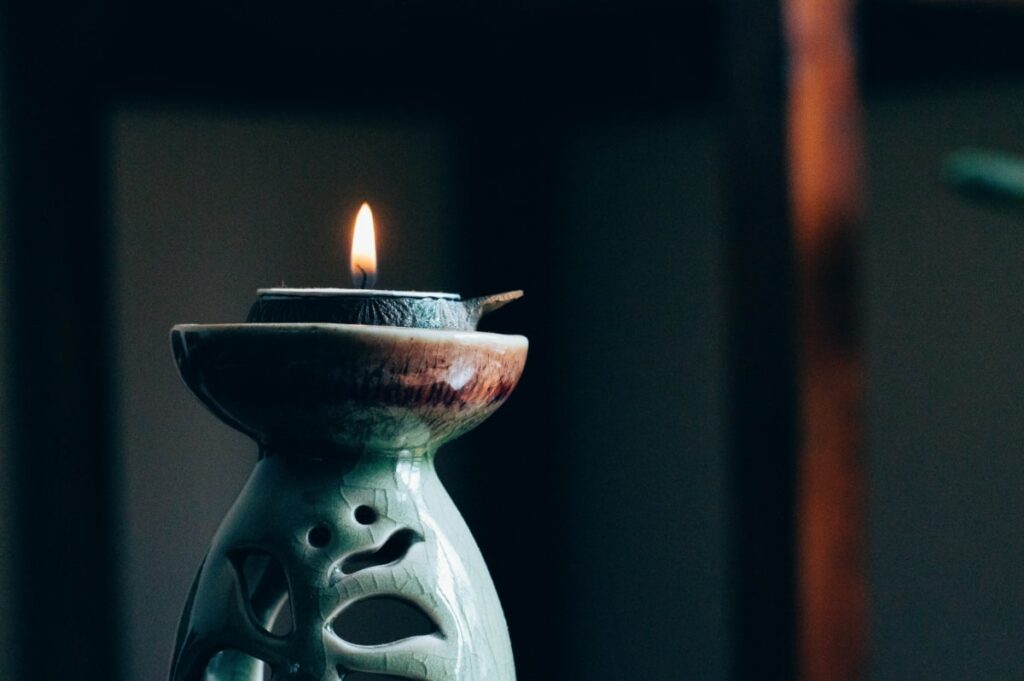 Burning incense in feng shui container